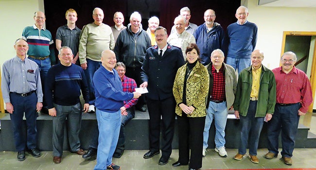 Lighthouse Chorus donates to Niles Salvation Army Leader Publications